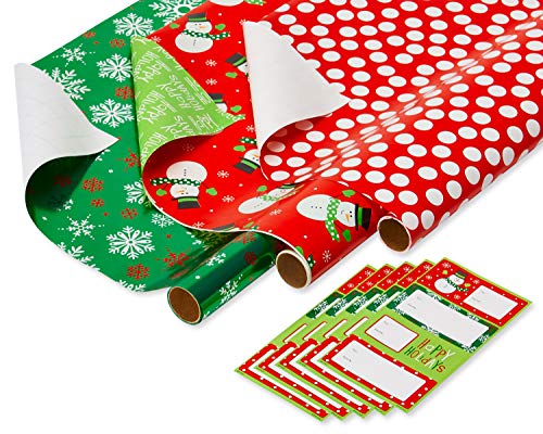 American Greetings Kids Christmas Wrapping Paper Set, 120 sq ft, 4 Rolls with Bows and Tags I837576